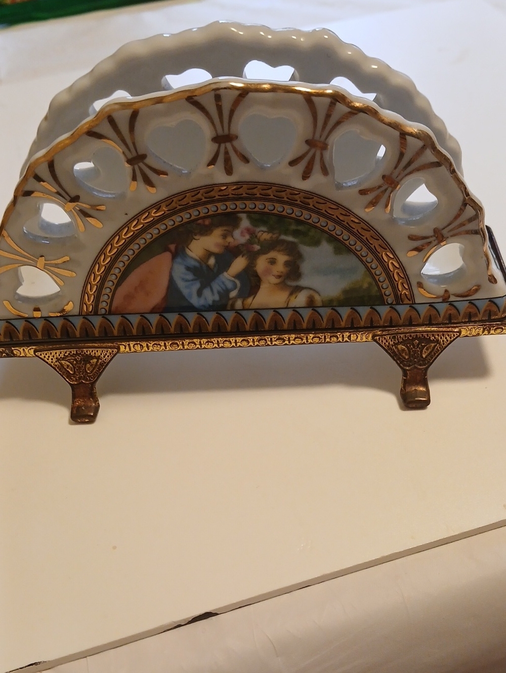 Active USA White and Gold Porcelain Napkin Holder with Romantic Scene